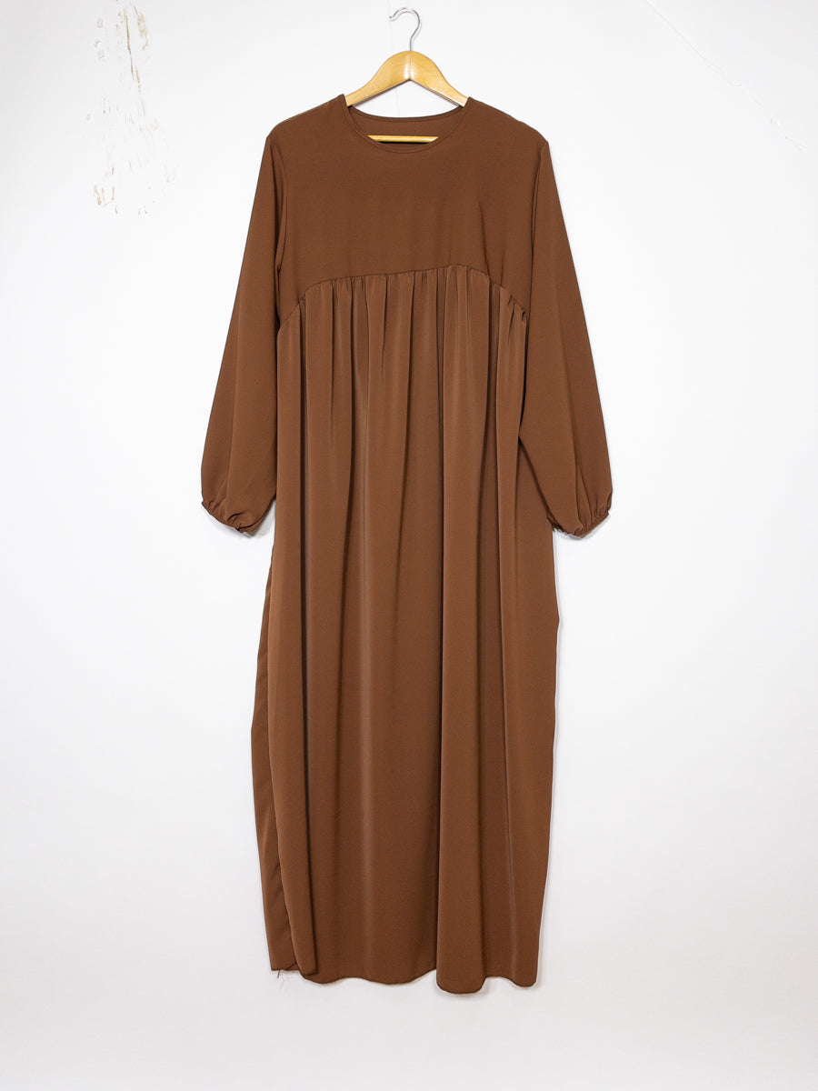 Abaya longue femme REF: RO2326PK - Abaya longue femme en soie de medine tissu fluide et doux , coupe ample et élégante