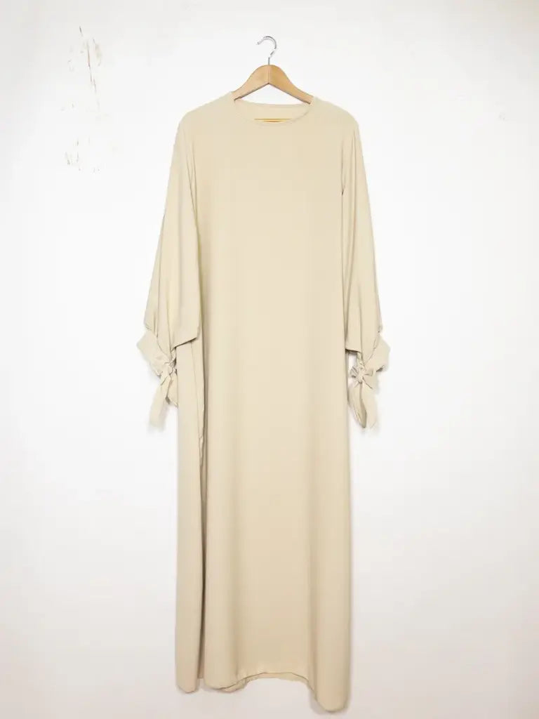 Robe abaya réf RoL2378pk - Robe abaya longue en soie de Médine longue pour femme 185cm avec manches ballon et nœud fluide et sophistiquée