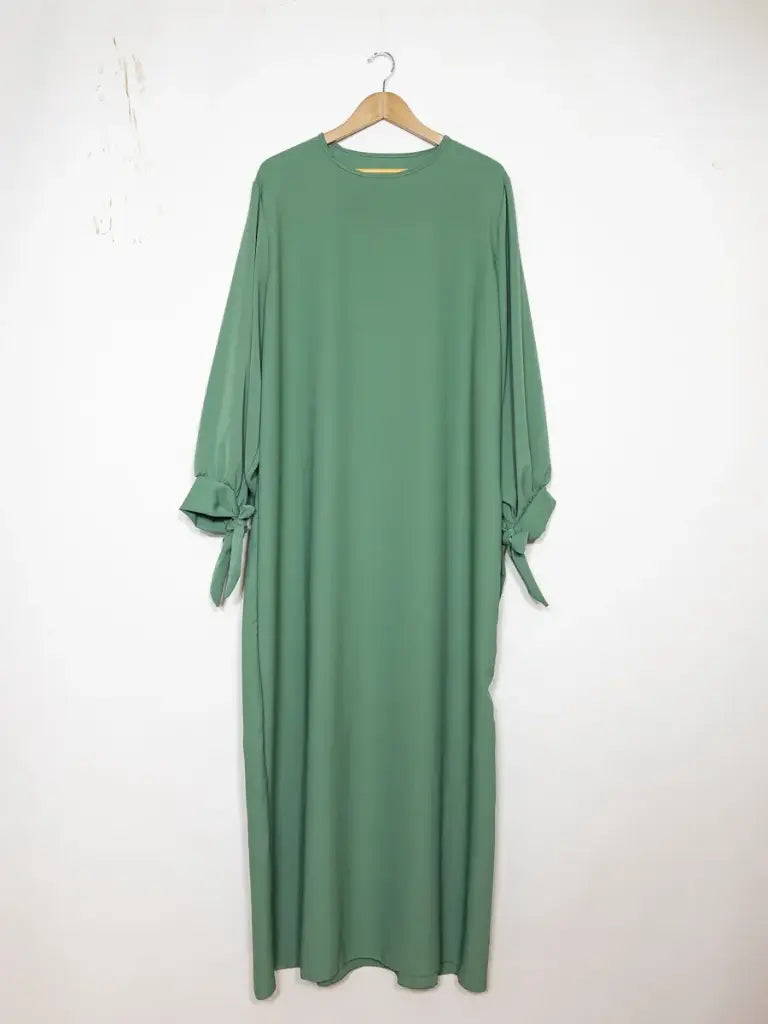 Robe abaya réf RoL2378pk - Robe abaya longue en soie de Médine longue pour femme 185cm avec manches ballon et nœud fluide et sophistiquée